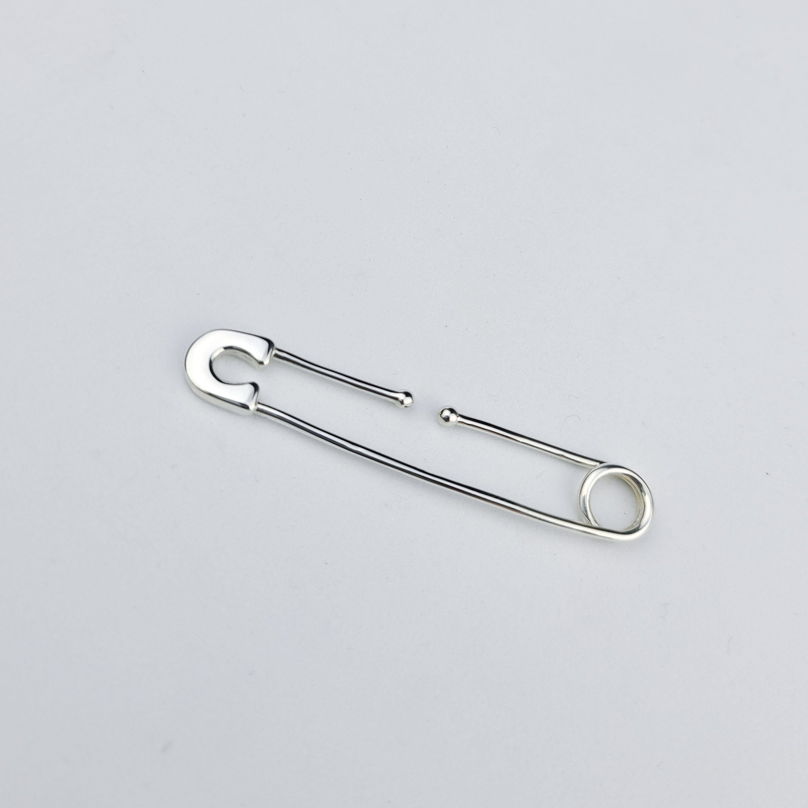 Bold Cheek Piercing Safety Pin