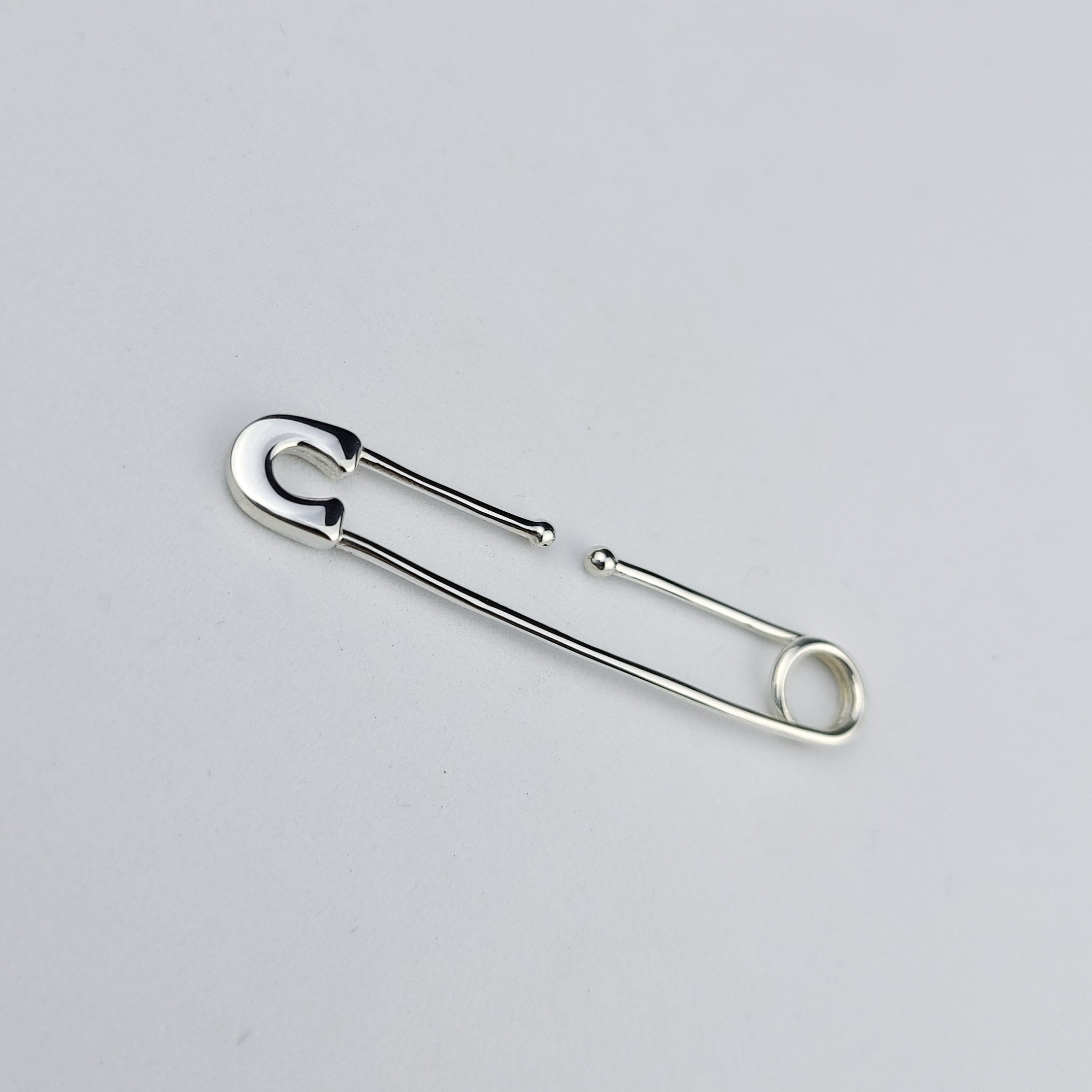Bold Cheek Piercing Safety Pin