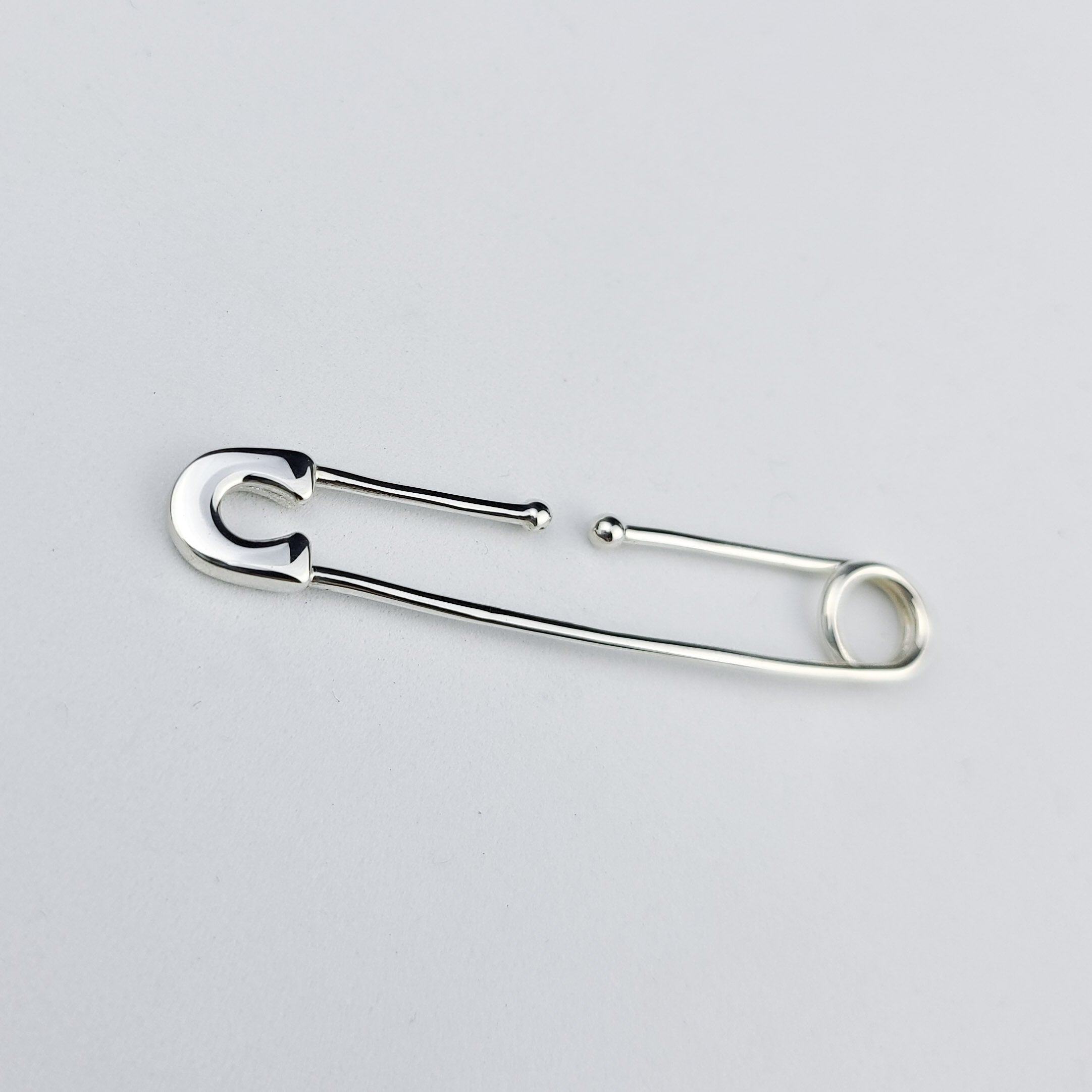 Bold Cheek Piercing Safety Pin