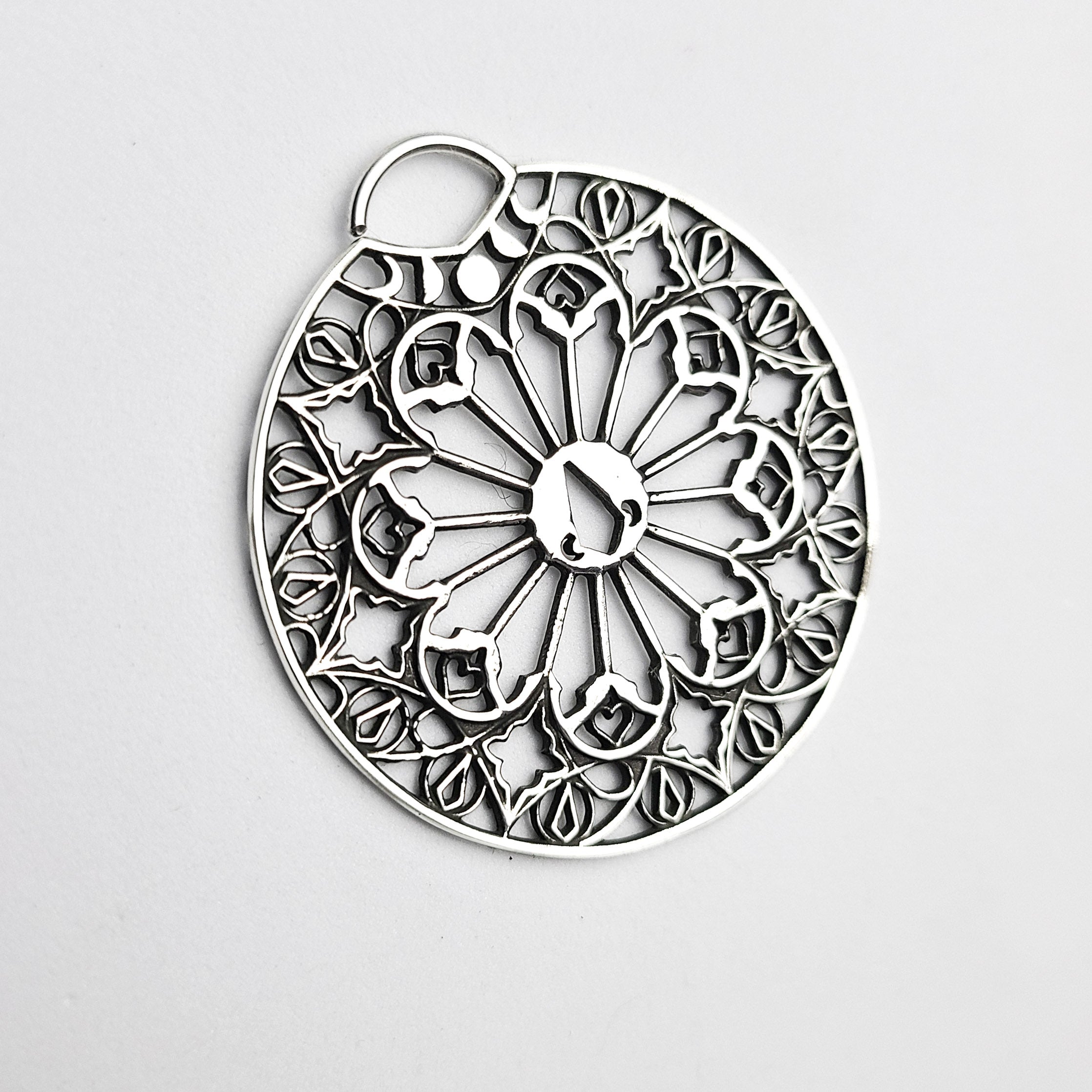 Oversized Moon Phase Cathedral Septum Piercing
