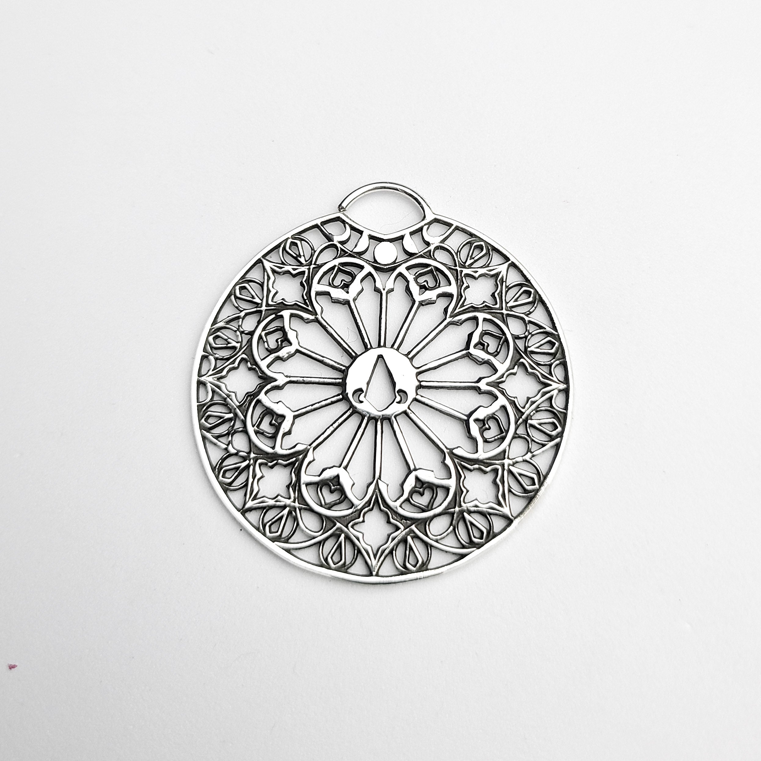 Oversized Moon Phase Cathedral Septum Piercing