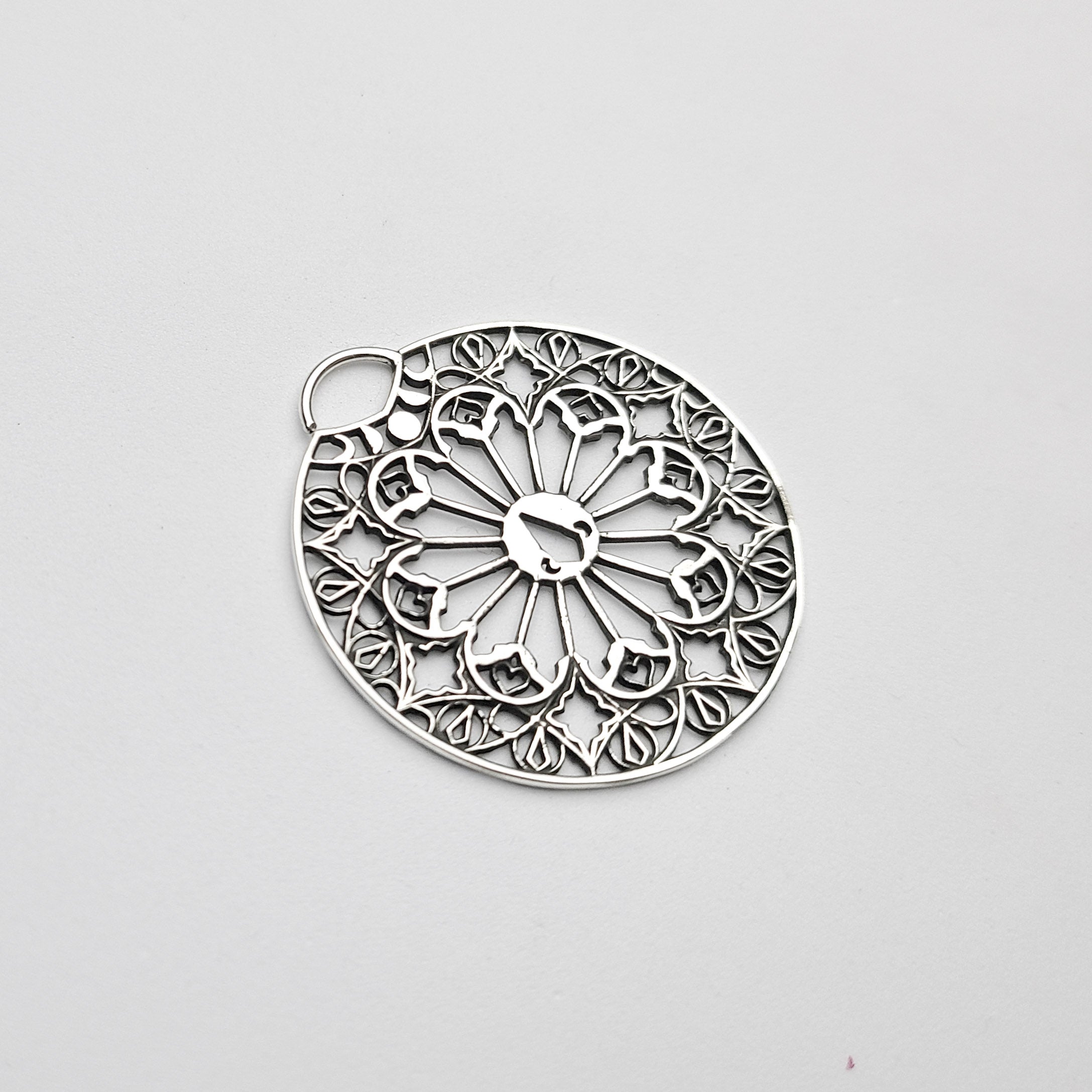 Oversized Moon Phase Cathedral Septum Piercing