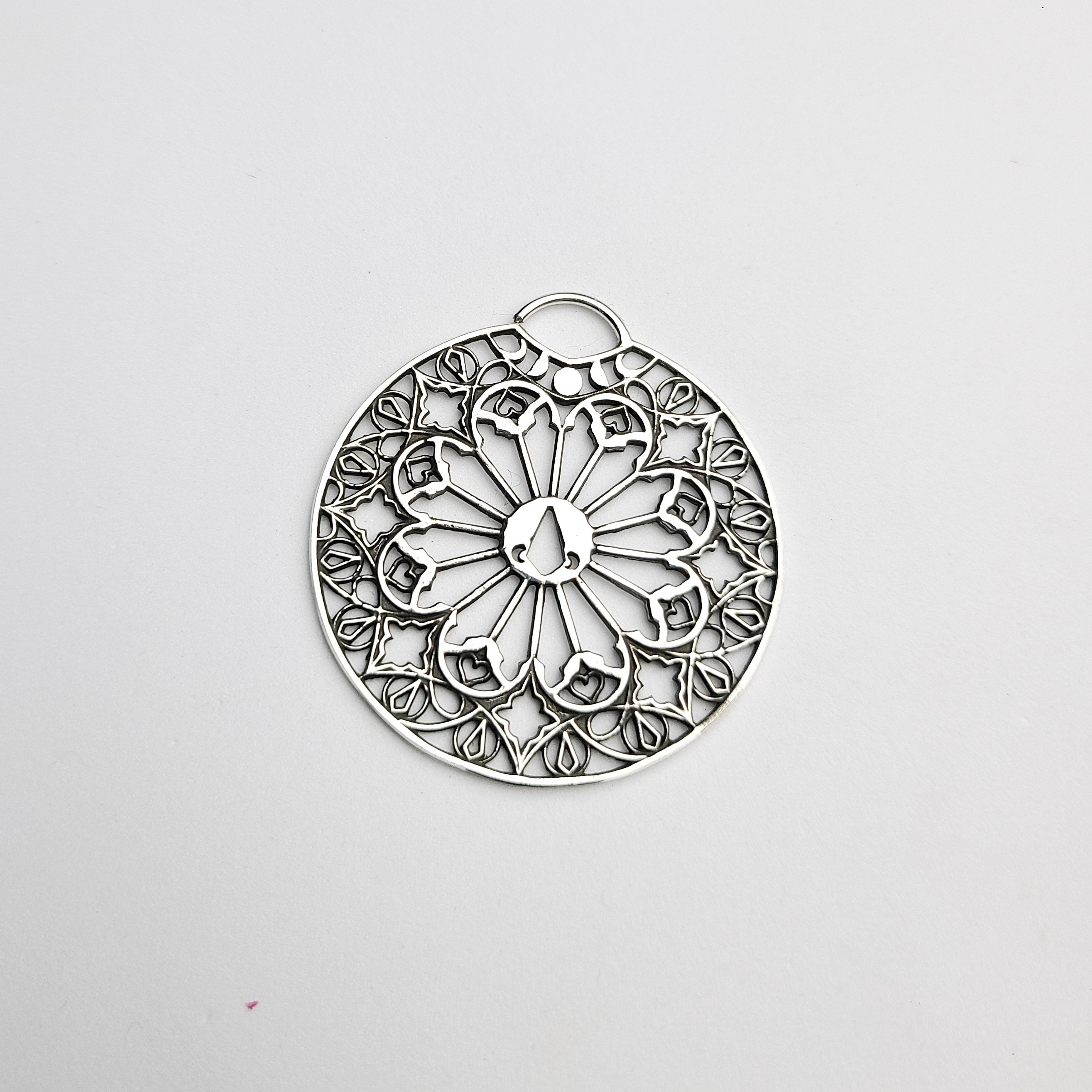 Oversized Moon Phase Cathedral Septum Piercing