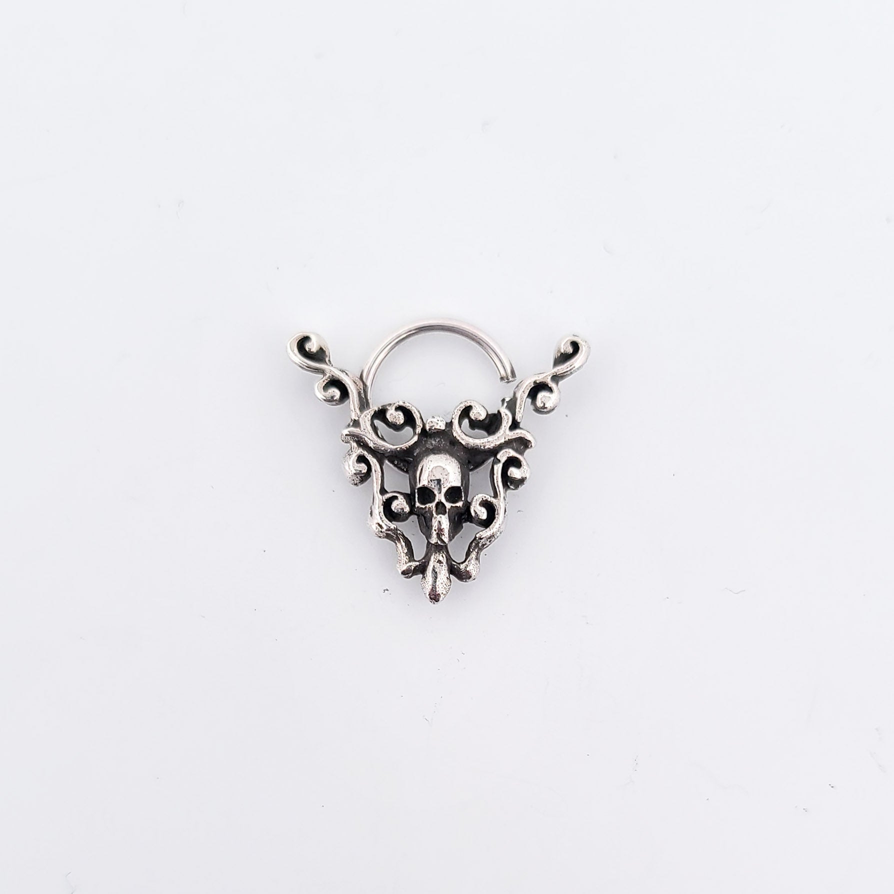 Skull and Lace Septum Piercing